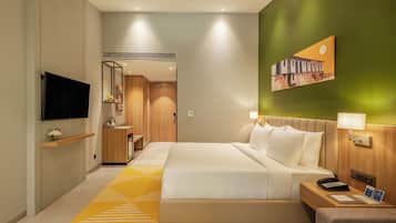 Deluxe Double Room With Balcony | Minibar, desk, laptop workspace, blackout curtains