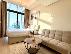 Smart TV - Cozy Azizi Riviera Studio High Floor Burj Khlifa View in Dubai (Dubai)