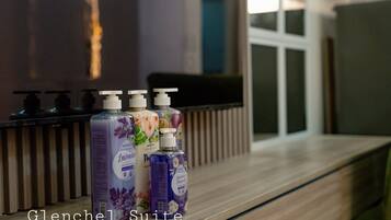 Hair dryer, towels, soap, shampoo