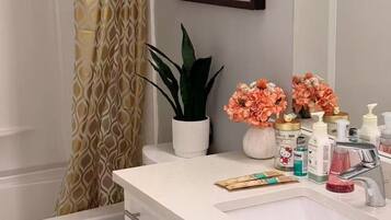 Hair dryer, towels, soap, toilet paper