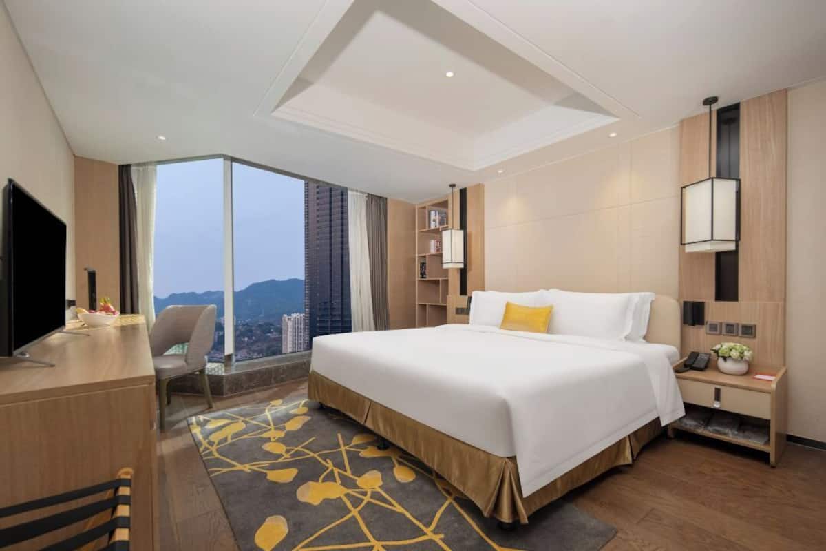 Family Suite, River View | In-room safe, laptop workspace, blackout drapes, soundproofing