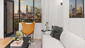 A modern living room with a city view, a sofa, a chair, a small table, and a door leading outside. - Bright 2-Bed Apt with Spectacular Bridge Views (Glebe)