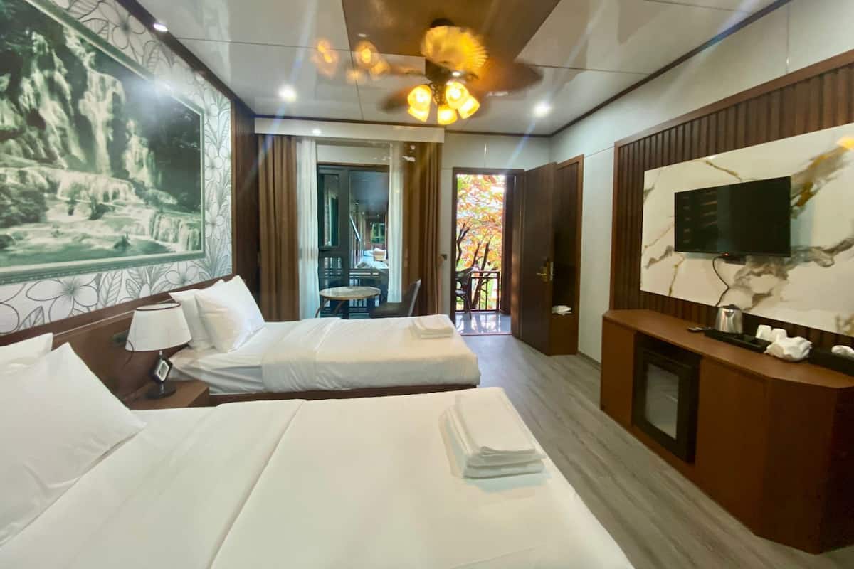 Family Room, Balcony | In-room safe, desk, blackout curtains, free WiFi