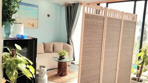 Deluxe-Doppelzimmer, Meerblick | Wohnbereich