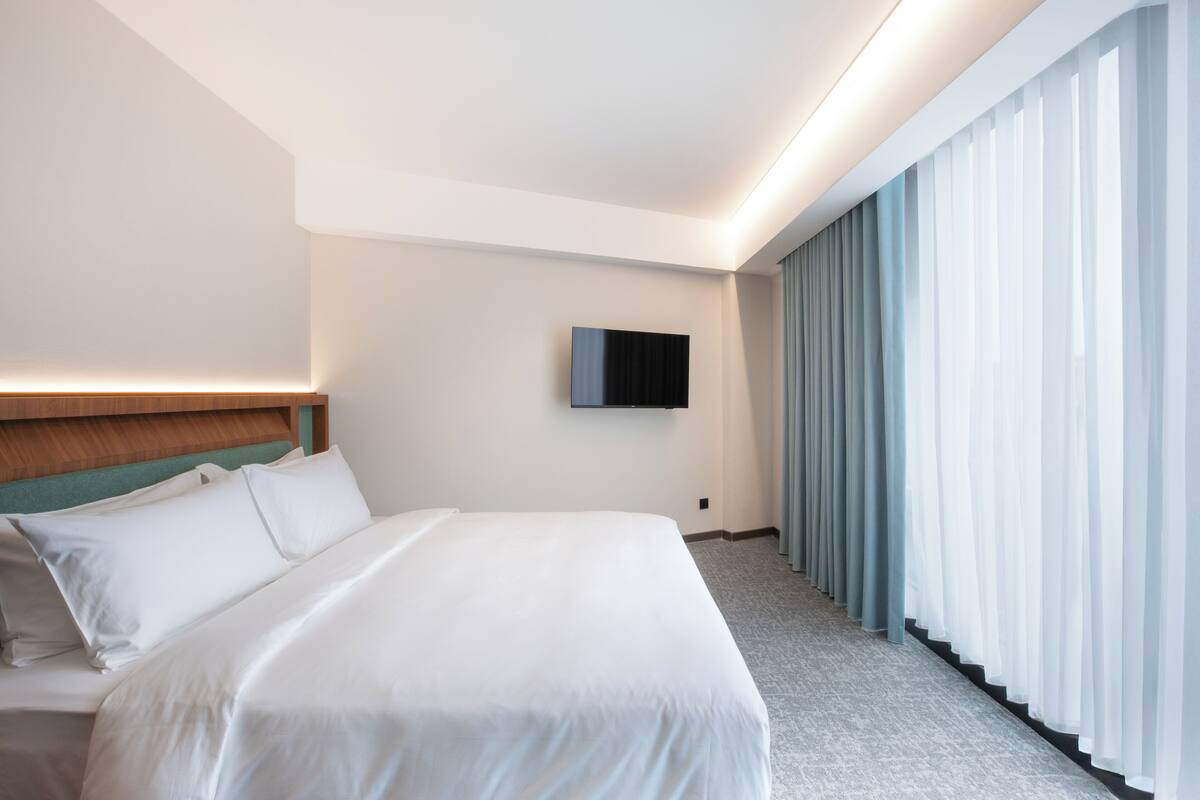 Phòng đôi Deluxe, không hút thuốc | Két bảo mật tại phòng, màn/rèm cản sáng