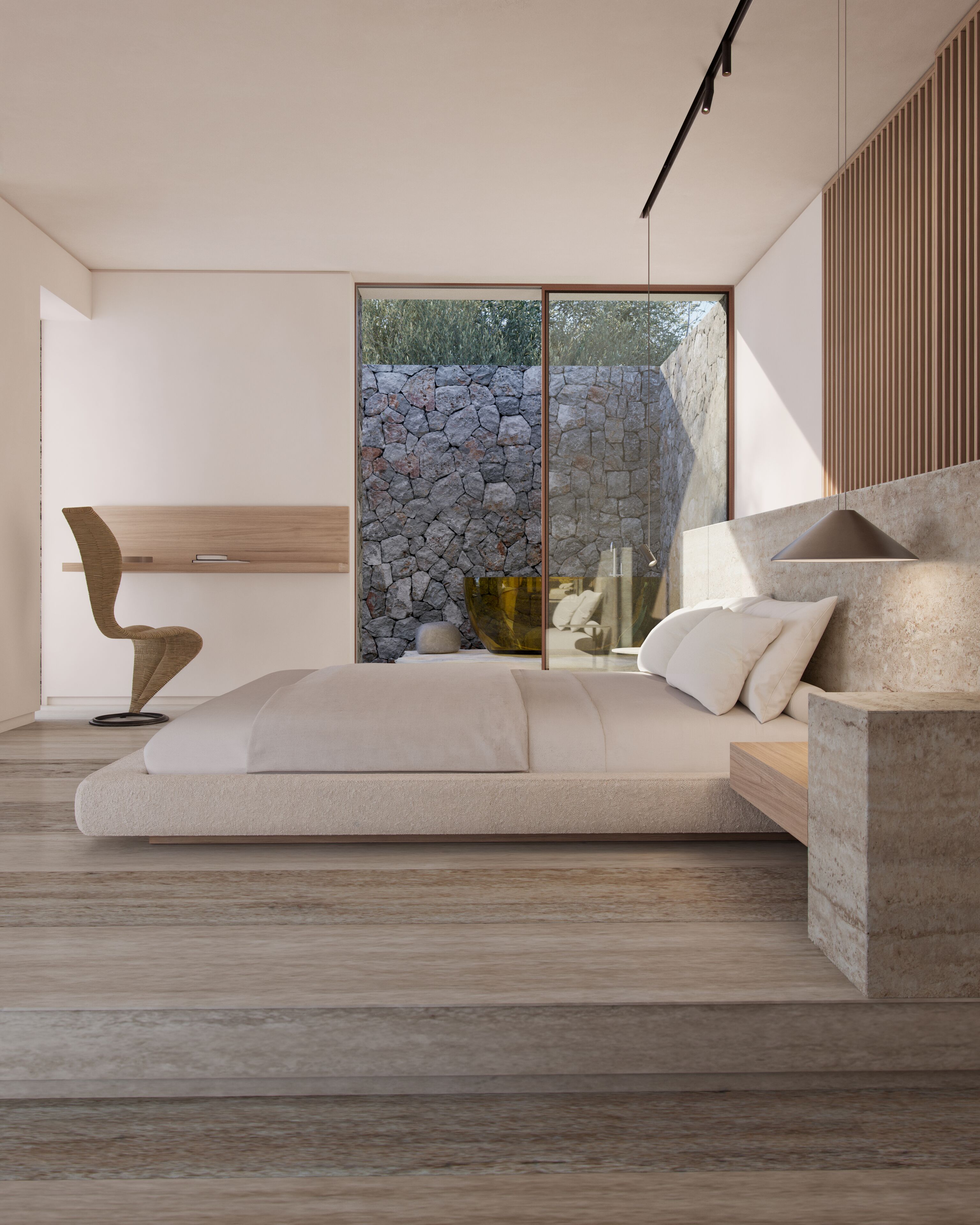 A modern bedroom with a stone wall, a large window, and a minimalist design.