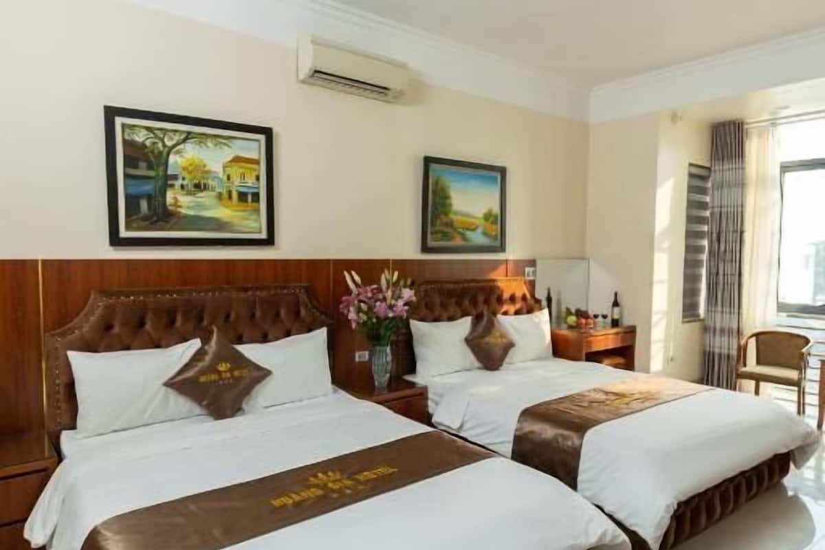 Family Room, City View | Desk, blackout drapes, soundproofing, iron/ironing board