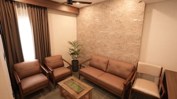 Executive Suite, City View | Desk, laptop workspace, iron/ironing board, free WiFi