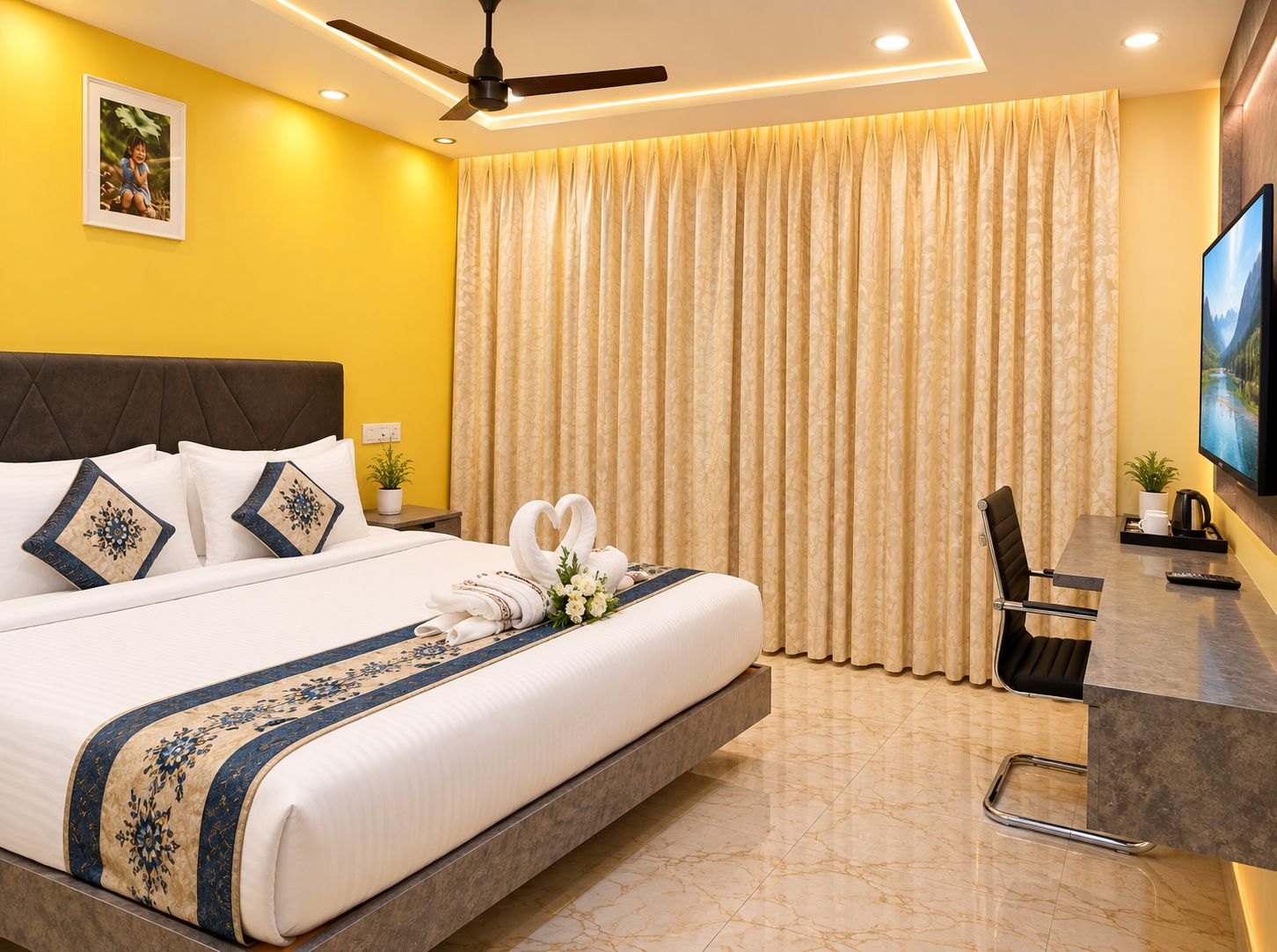 A hotel room with a bed, a desk, a chair, a television, and a ceiling fan.