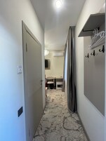 Single Room, Courtyard View | Minibar, desk, laptop workspace, blackout drapes