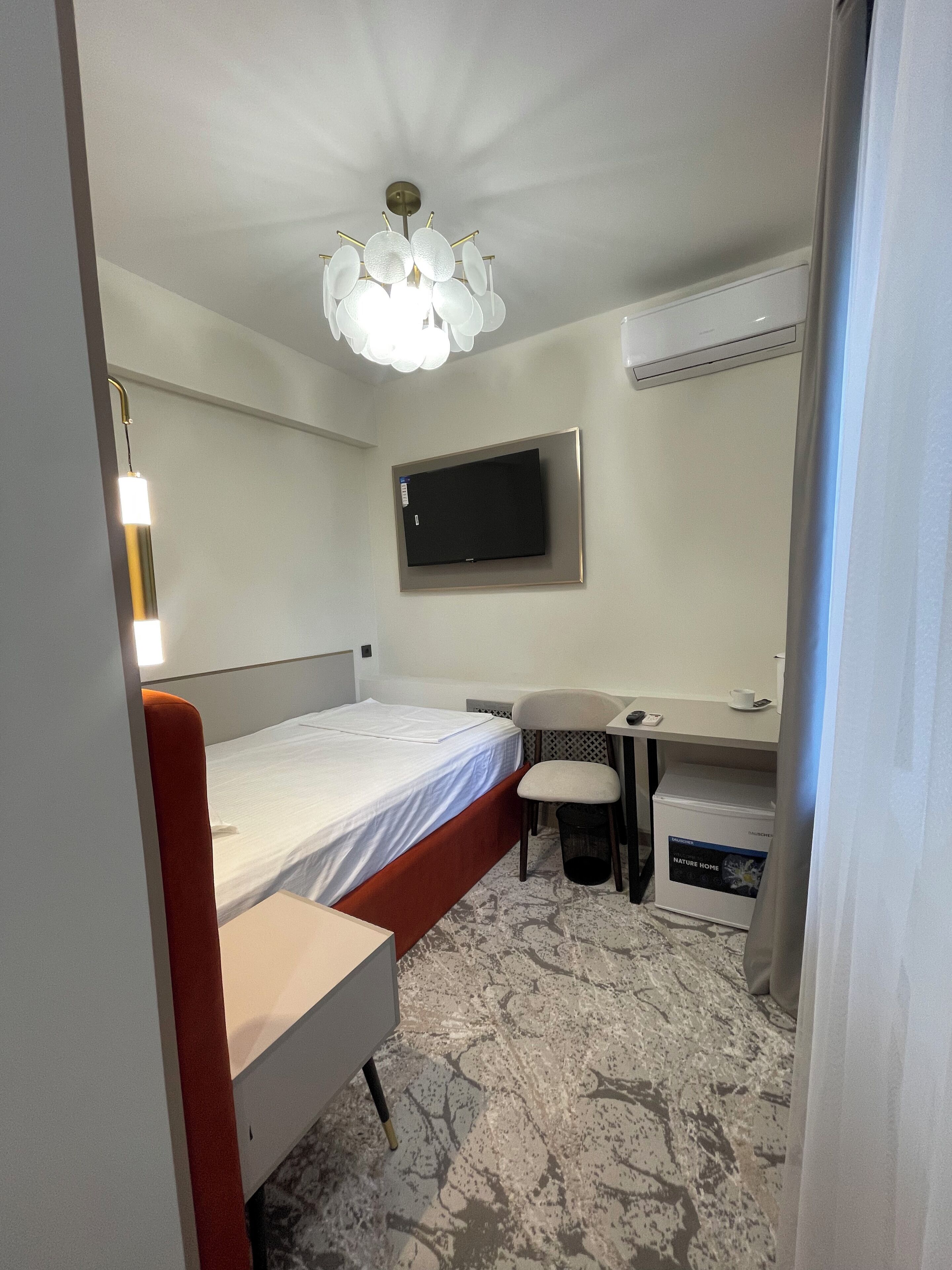 Minibar, desk, laptop workspace, blackout curtains