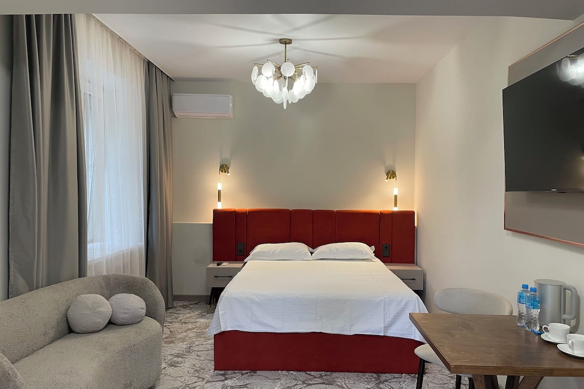 Minibar, desk, laptop workspace, blackout curtains