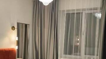 Blackout drapes, iron/ironing board, free WiFi