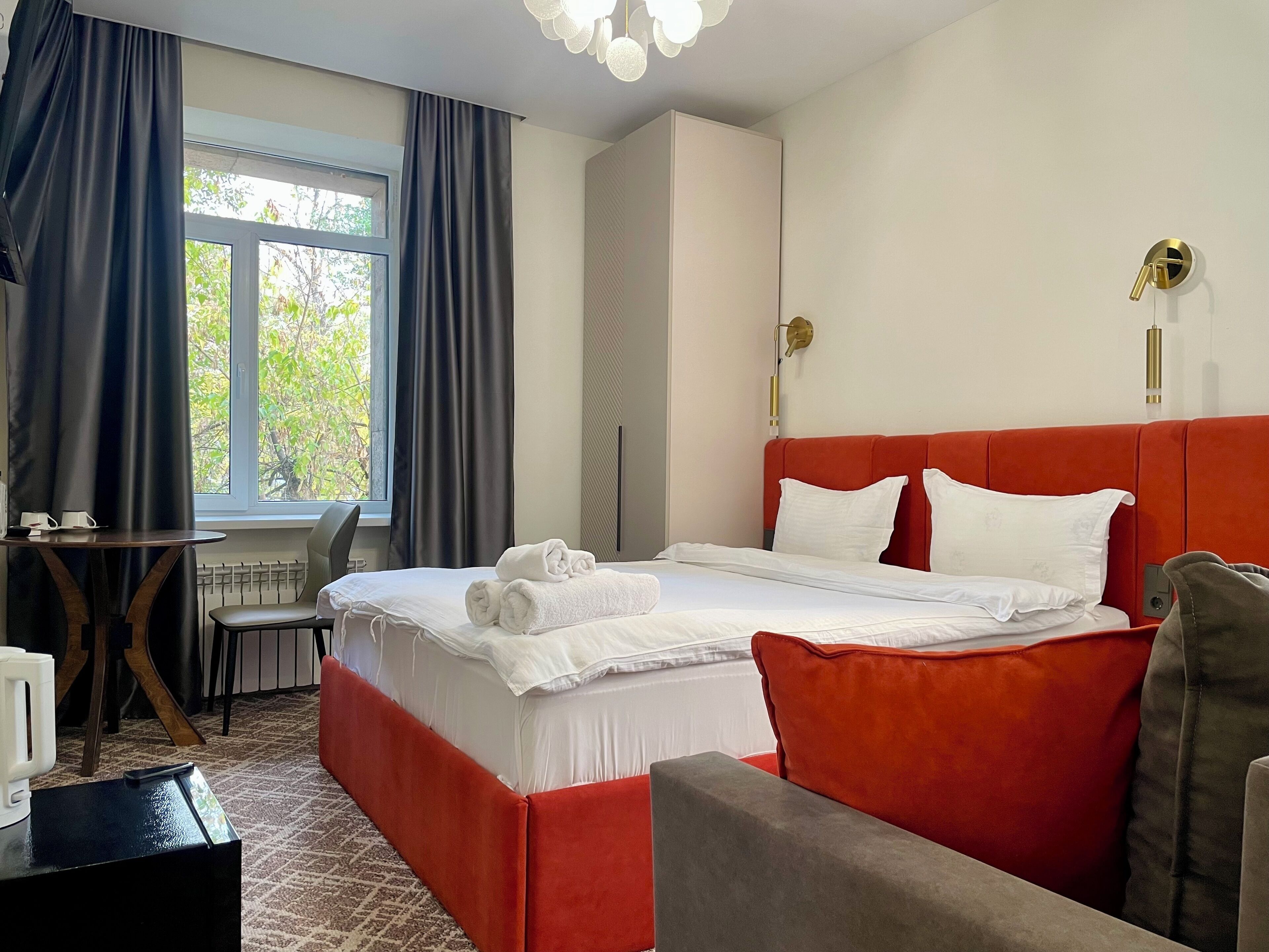 Minibar, desk, laptop workspace, blackout curtains