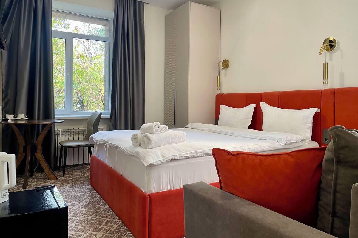 Minibar, desk, laptop workspace, blackout curtains