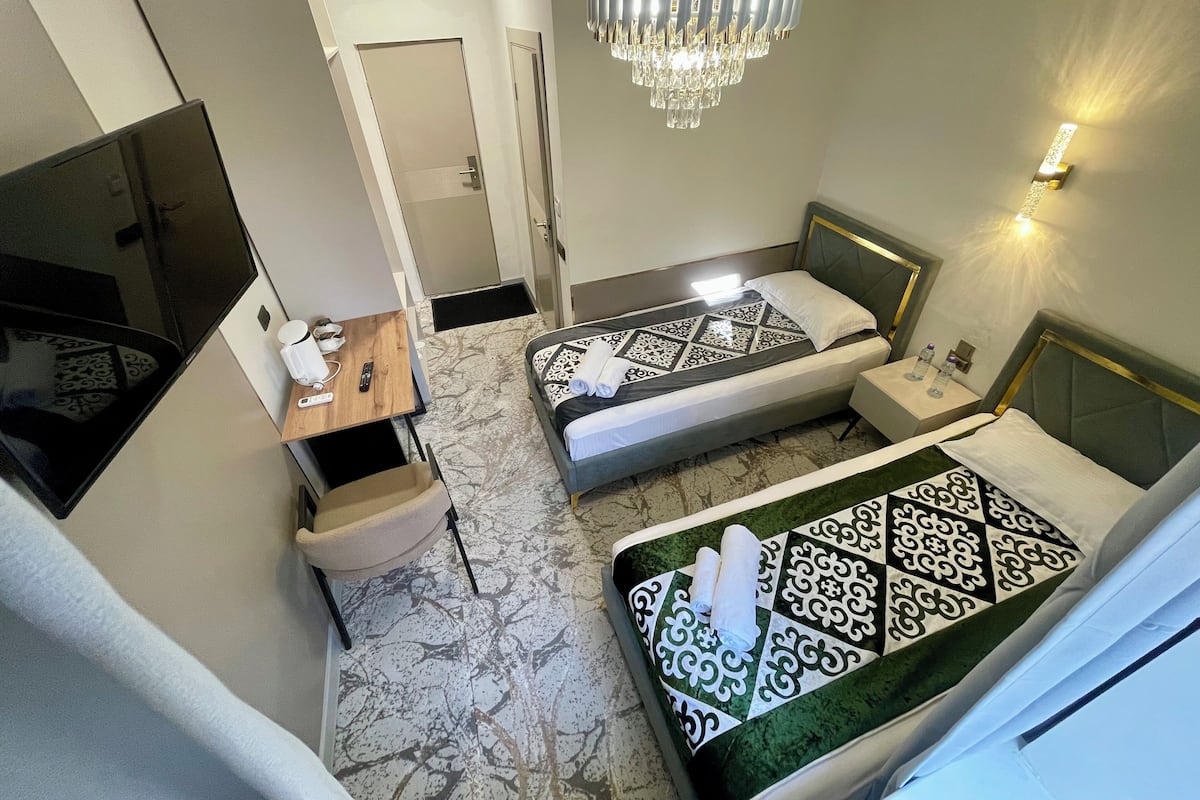 Minibar, desk, laptop workspace, blackout curtains