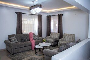 Family Bungalow, Garden View | Living area | 32-inch Smart TV with digital channels - The Country Side Villa Nanyuki (Nanyuki)