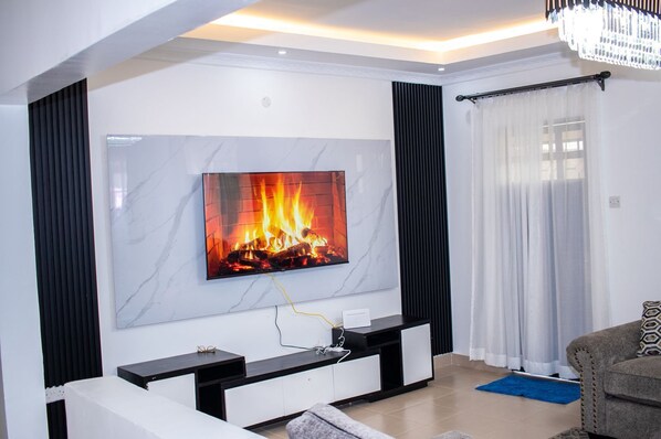 Family Bungalow, Garden View | Living area | 32-inch Smart TV with digital channels - The Country Side Villa Nanyuki (Nanyuki)