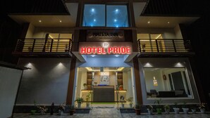 A hotel with a prominent sign reading "HOTEL PRIDE" and a visible reception area. - Hotel Pride  (Gangtok)