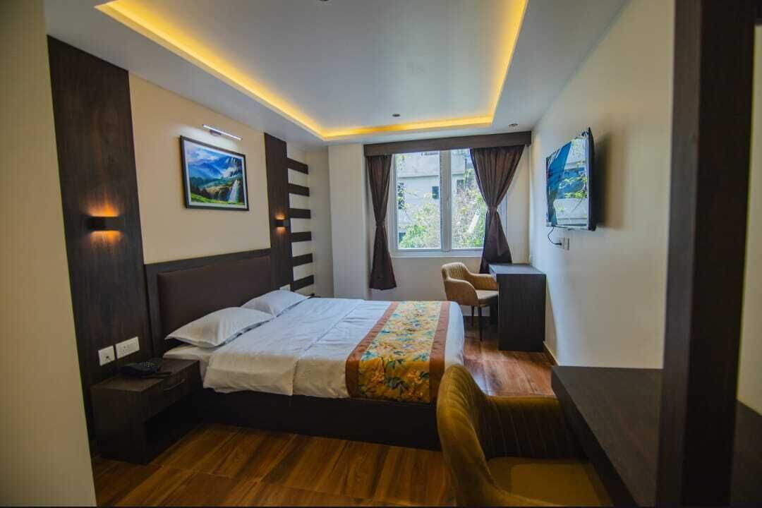 ห้องดีลักซ์ | เครื่องนอนระดับพรีเมียม, โต๊ะทำงาน, ผ้าม่านกันแสง, Wi-Fi ฟรี