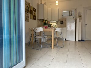 Apartment, 2 Bedrooms, Balcony | Dining - Modern Flat Just 150 mt From the sea (Rosolina)