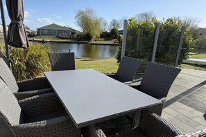 Outdoor dining - Holiday home in Makkum with swimming pool (Makkum)