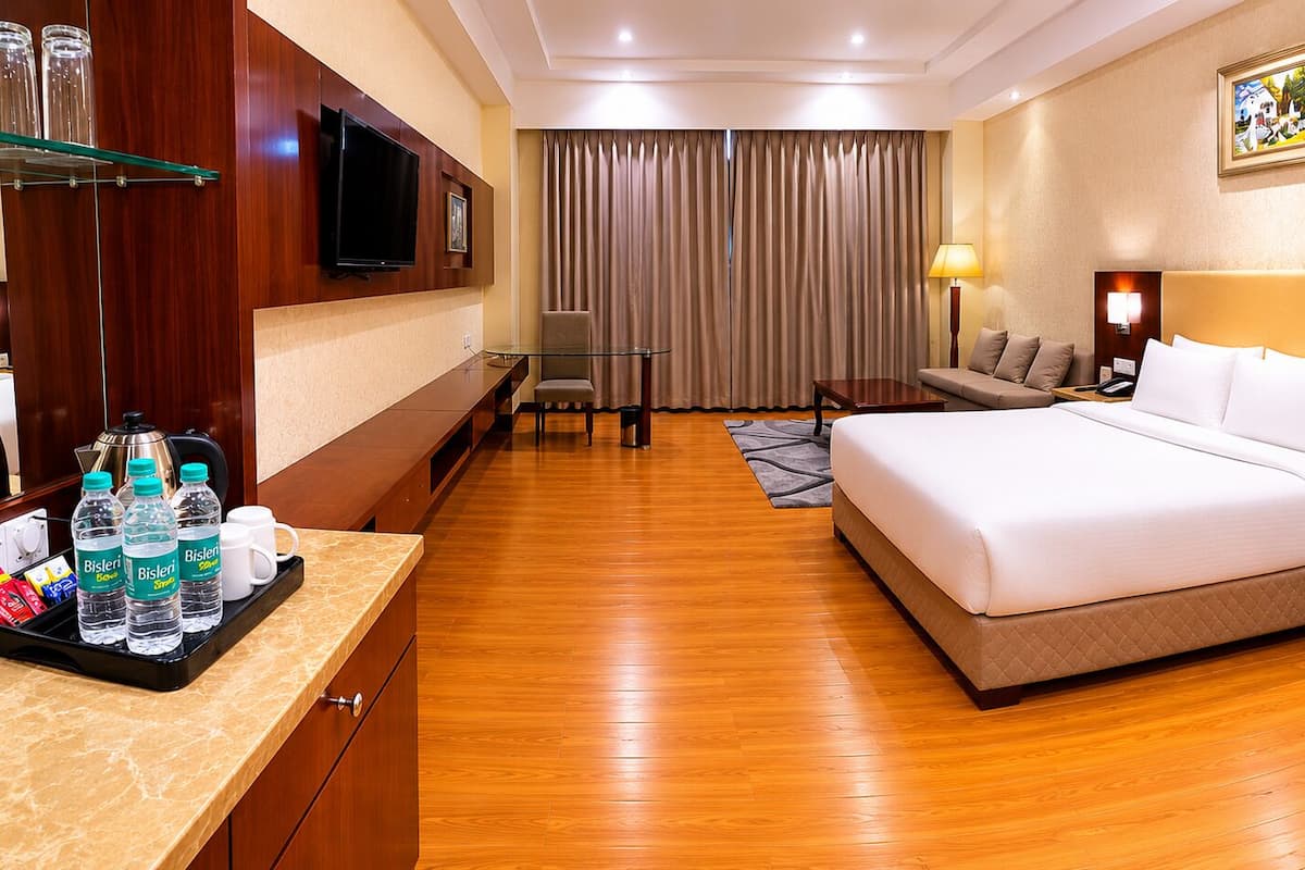 Deluxe Room, 1 Double Bed, City View | Minibar, desk, laptop workspace, blackout drapes