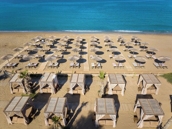 Beach nearby, white sand, beach cabanas, sun-loungers