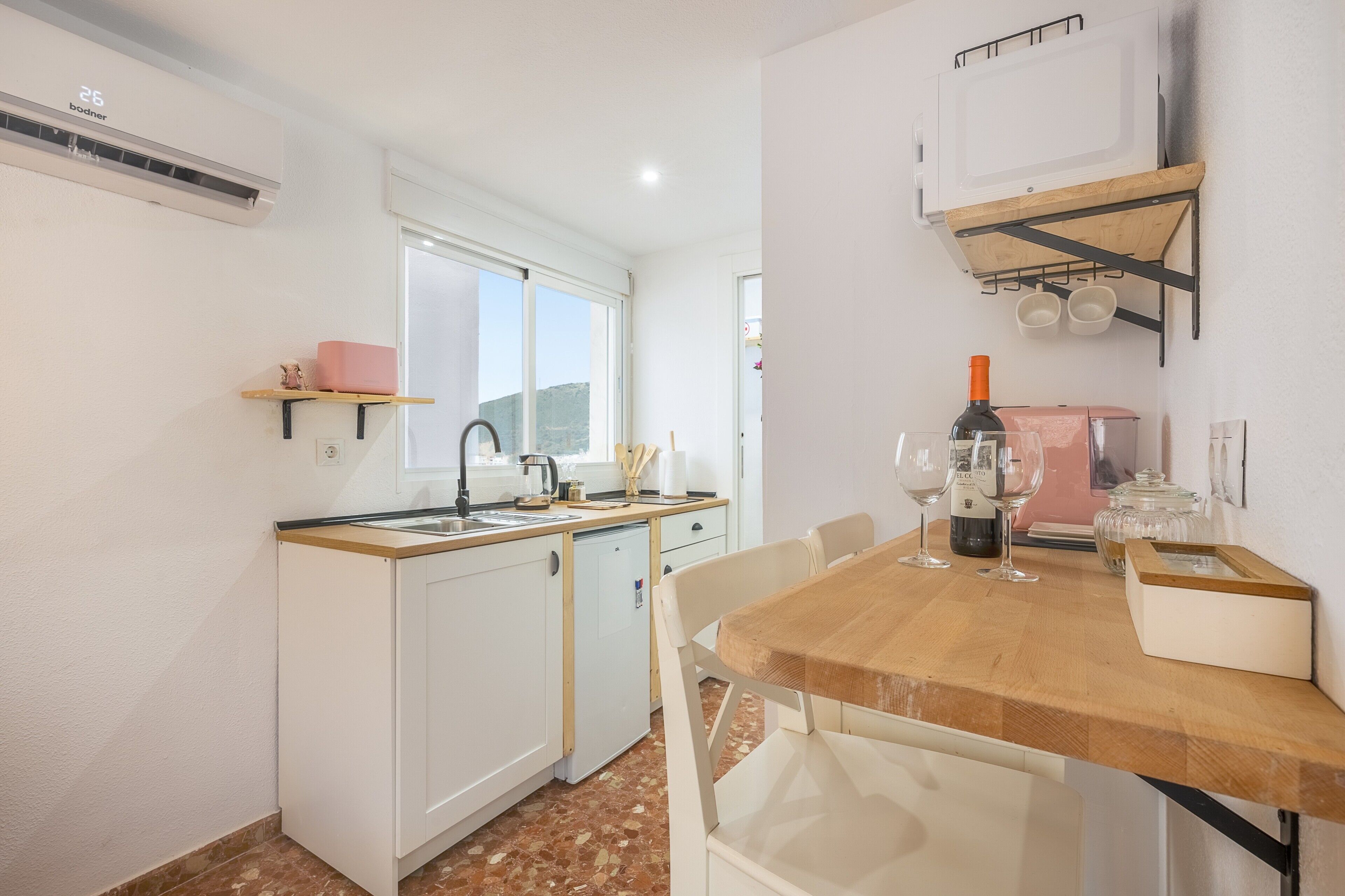 Fridge, microwave, stovetop, coffee/tea maker