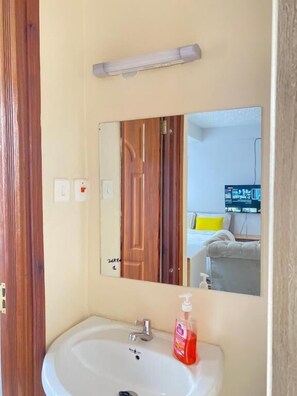 Classic Studio | Bathroom | Shower, slippers, towels, soap