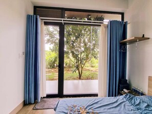 Habitació doble estàndard, vistes al jardí | Planxa i posts de planxar i wifi gratuïta