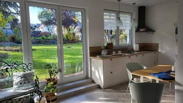 Appartement Confort, vue jardin | Intérieur