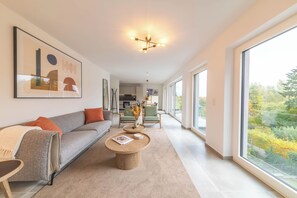 Comfort Apartment, Balcony, Garden View | Living area - Halternative Muscari (Luxembourg City)