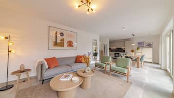 Comfort Apartment, Balcony, Garden View | Living area | Flat-screen TV