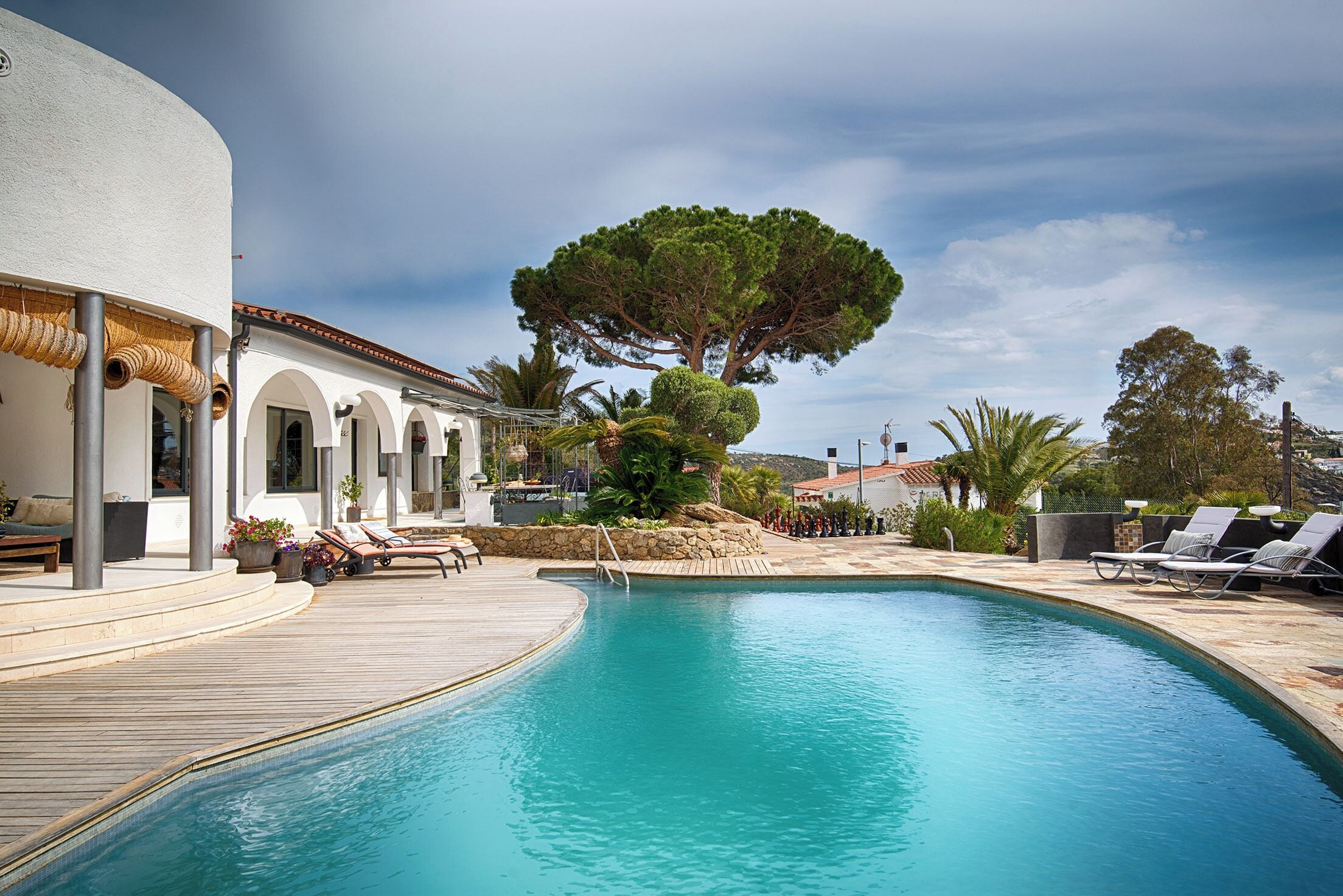 Seasonal outdoor pool, pool loungers