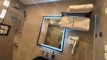 Shower, hair dryer, towels, soap