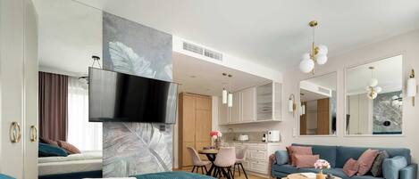 Tabla de planchar con plancha, wifi y ropa de cama