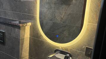 Shower, free toiletries, slippers, towels