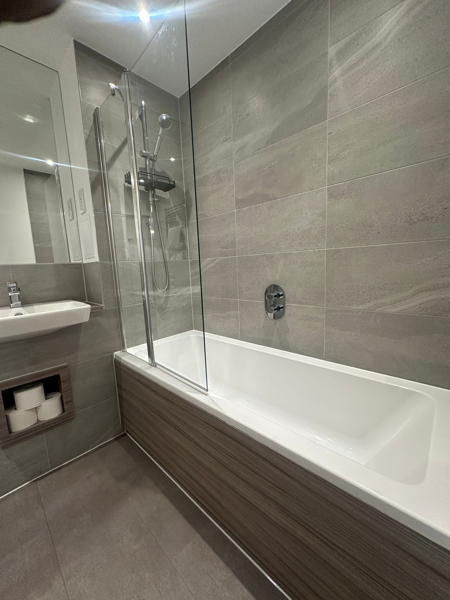 Shower, towels, toilet paper