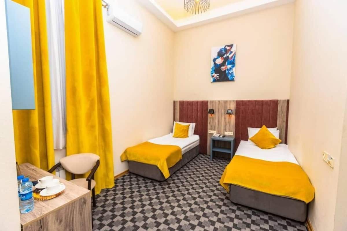 Triple Room, Courtyard View | Egyptian cotton sheets, premium bedding, down duvets, in-room safe