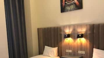 Basic Room | Egyptian cotton sheets, premium bedding, down comforters, in-room safe