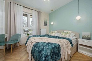 1 bedroom, desk, iron/ironing board, travel cot