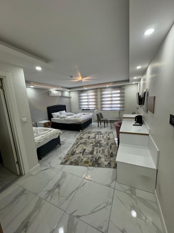 Deluxe Room, City View | Desk, laptop workspace, free WiFi