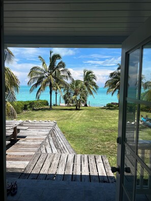 Terrace/patio - The Blue House,Oceanfront with 4 bedrooms 2 bath sleeps 10 in beds, water access (Spanish Wells)
