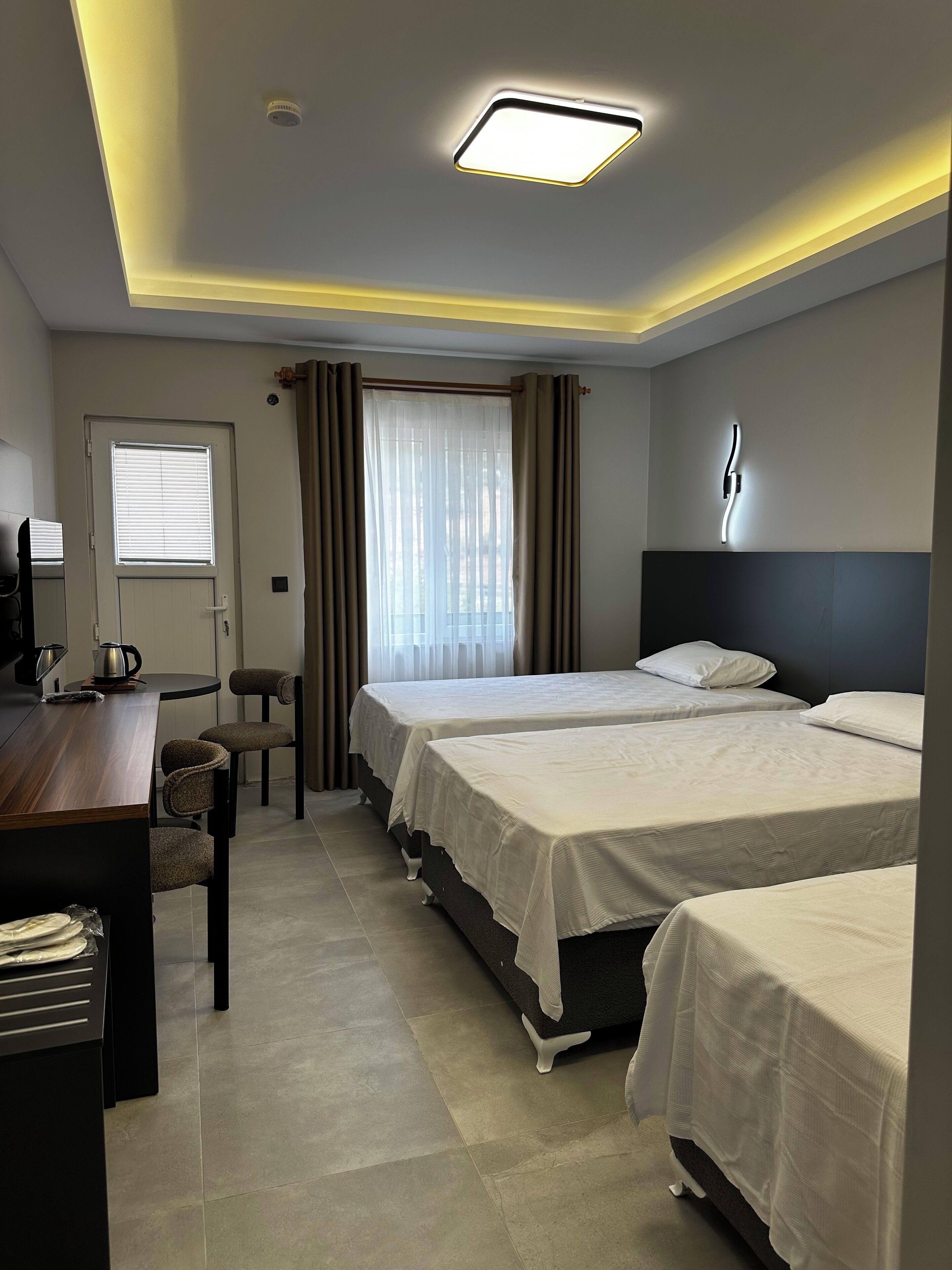 Triple Room, Balcony | Desk, laptop workspace, free WiFi