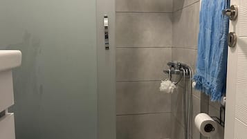 Basic Apartment | Bathroom | Slippers, towels