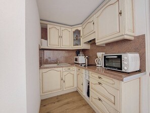 Fridge, microwave, coffee/tea maker, toaster