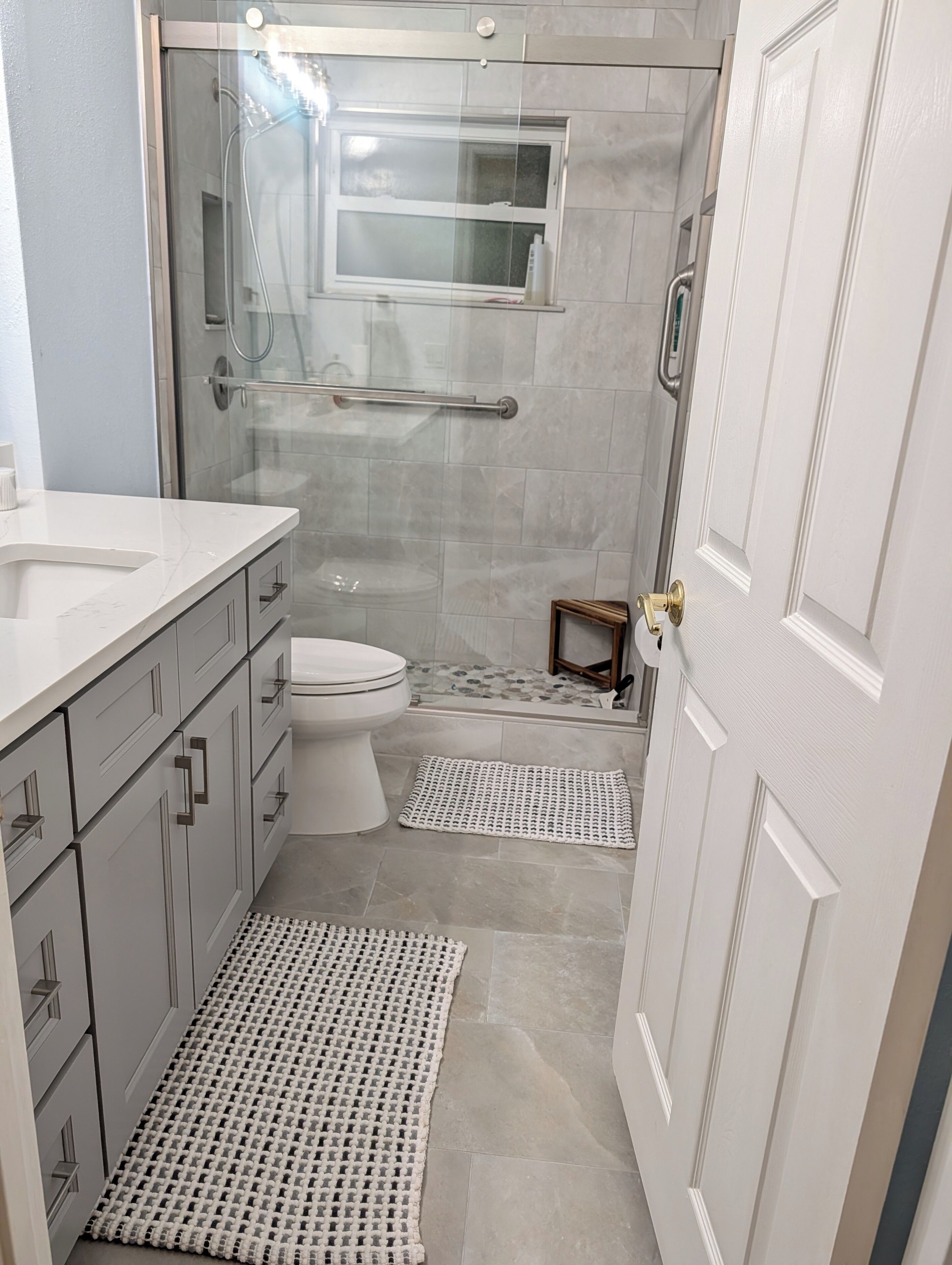 Shower, towels, soap, toilet paper