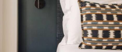 Iron/ironing board, travel crib, free WiFi, bed sheets