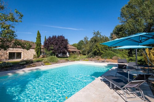 Gîte 'Cœur des Ondes - Coquelicot' avec terrasse privée et jardin commun